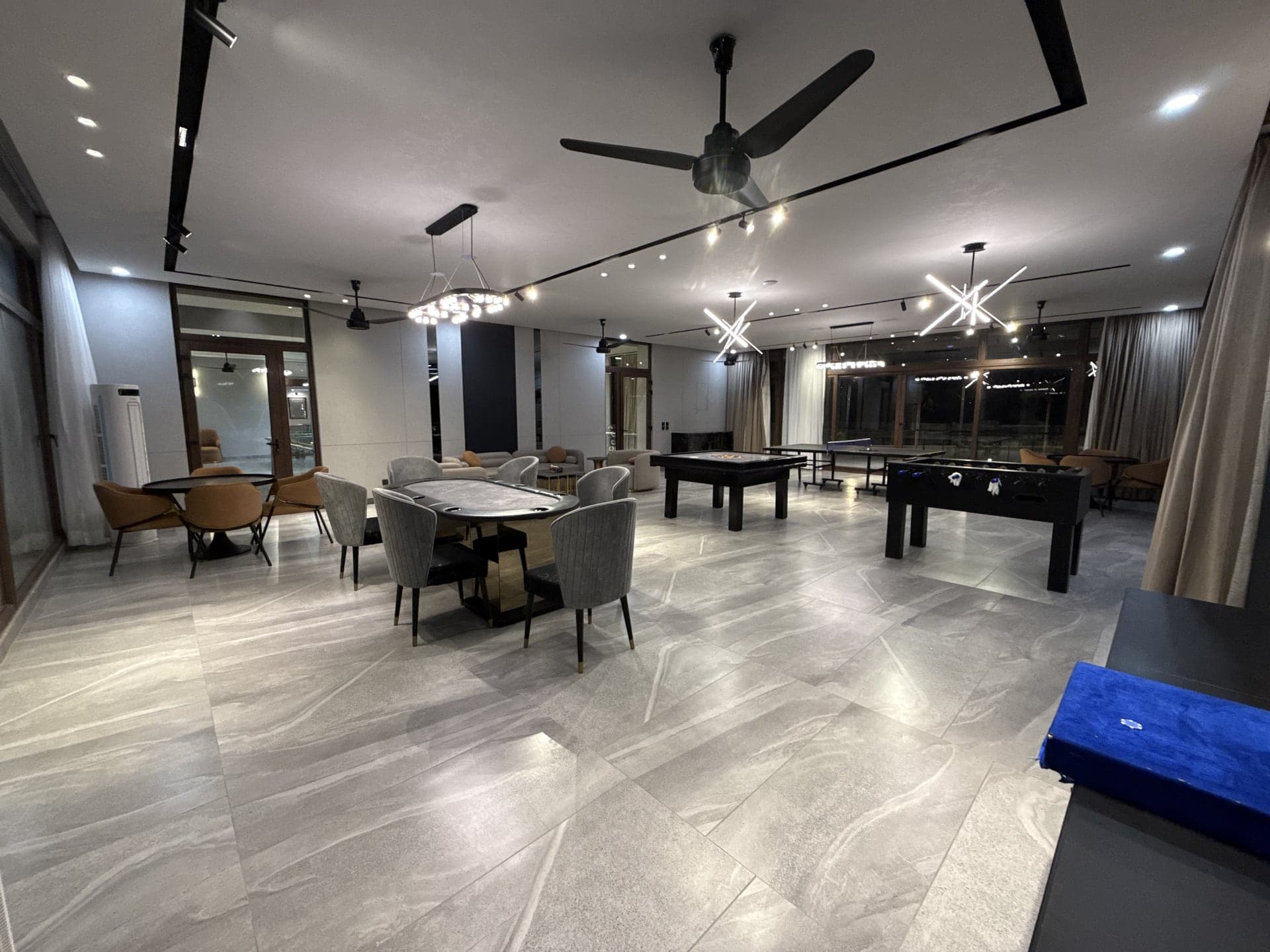 Indoor games lounge with poker, foosball, table tennis and snooker tables at FHU Resorts Karachi